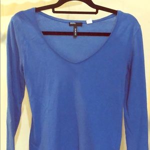 3 long sleeved v-neck shirts